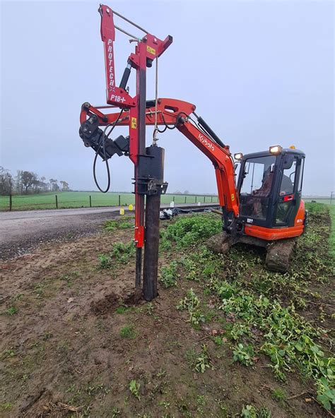 mini digger post knocker hire|digger mounted post knocker.